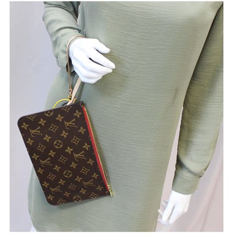 louis vuitton wrist bag|louis vuitton bag with pouch.